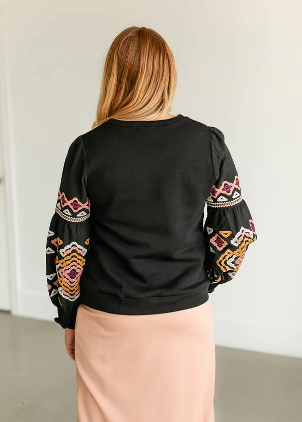 embroidered sleeve top